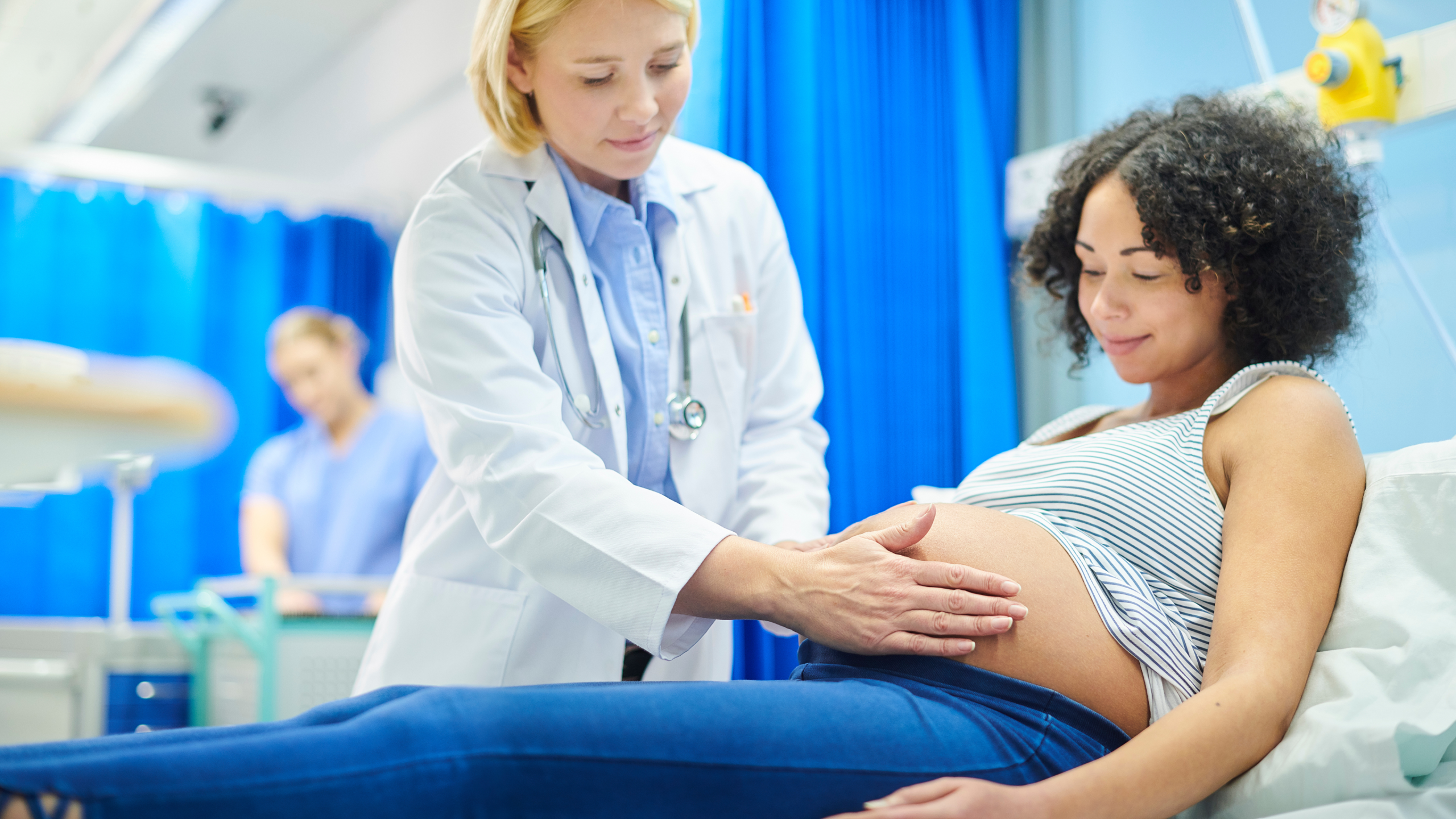 pregnant woman with doctor, maternity, doctors appointment